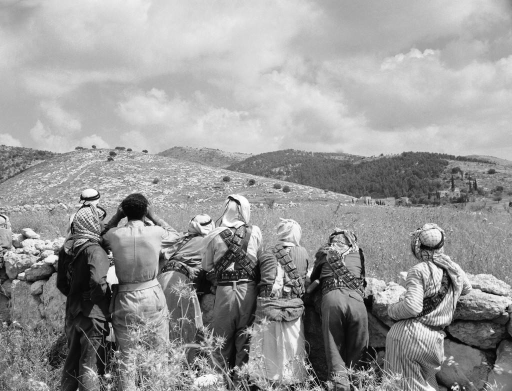 Arab fighters scan the hills of the Bab El Wad area on May 10, 1948. Arab and Jewish Forces clashed in a battle for control of the Tel Aviv-Jerusalem highway in Palestine. (AP Photo/JP) Ref #: PA.7436339 Date: 10/05/1948 