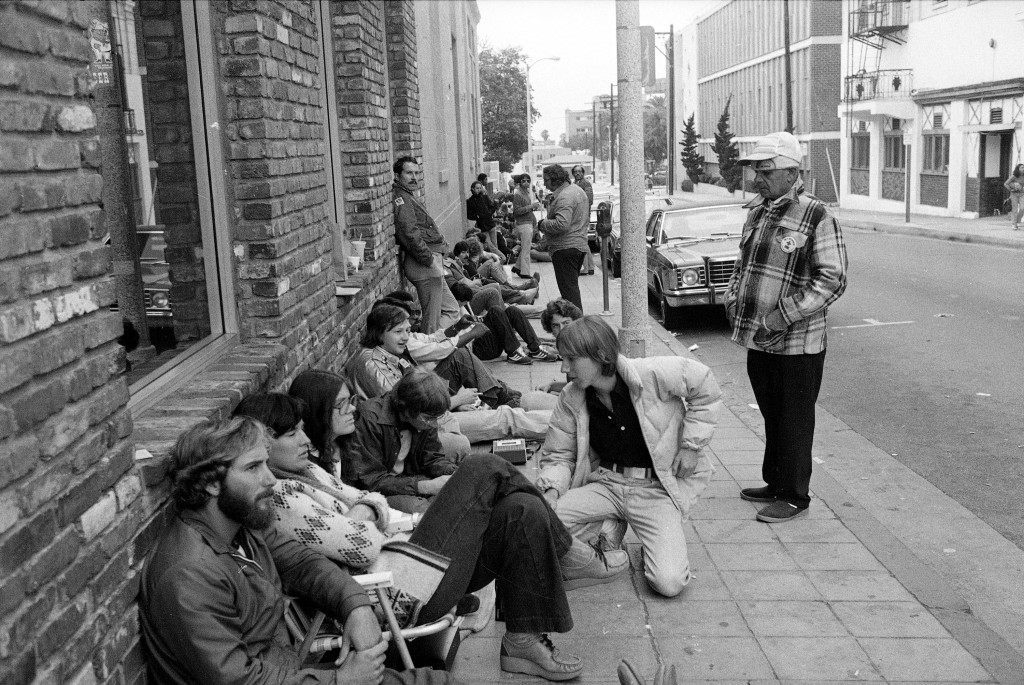 People maintain their places in line awaiting the midnight premiere of "The Empire Strikes Back," the sequel to "Star Wars," May 21, 1980. Some of the fans expected to be in line as long as 36 hours in order to be among the first in the nation to view the new movie. (AP Photo/Nick Ut)