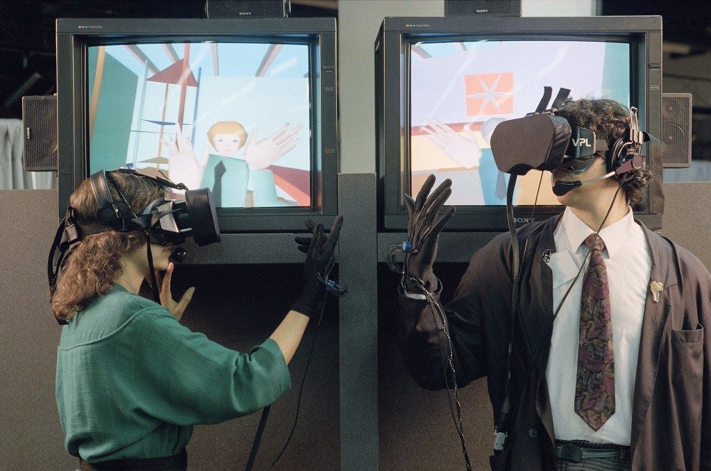 Two people demonstrate the EyePhone system