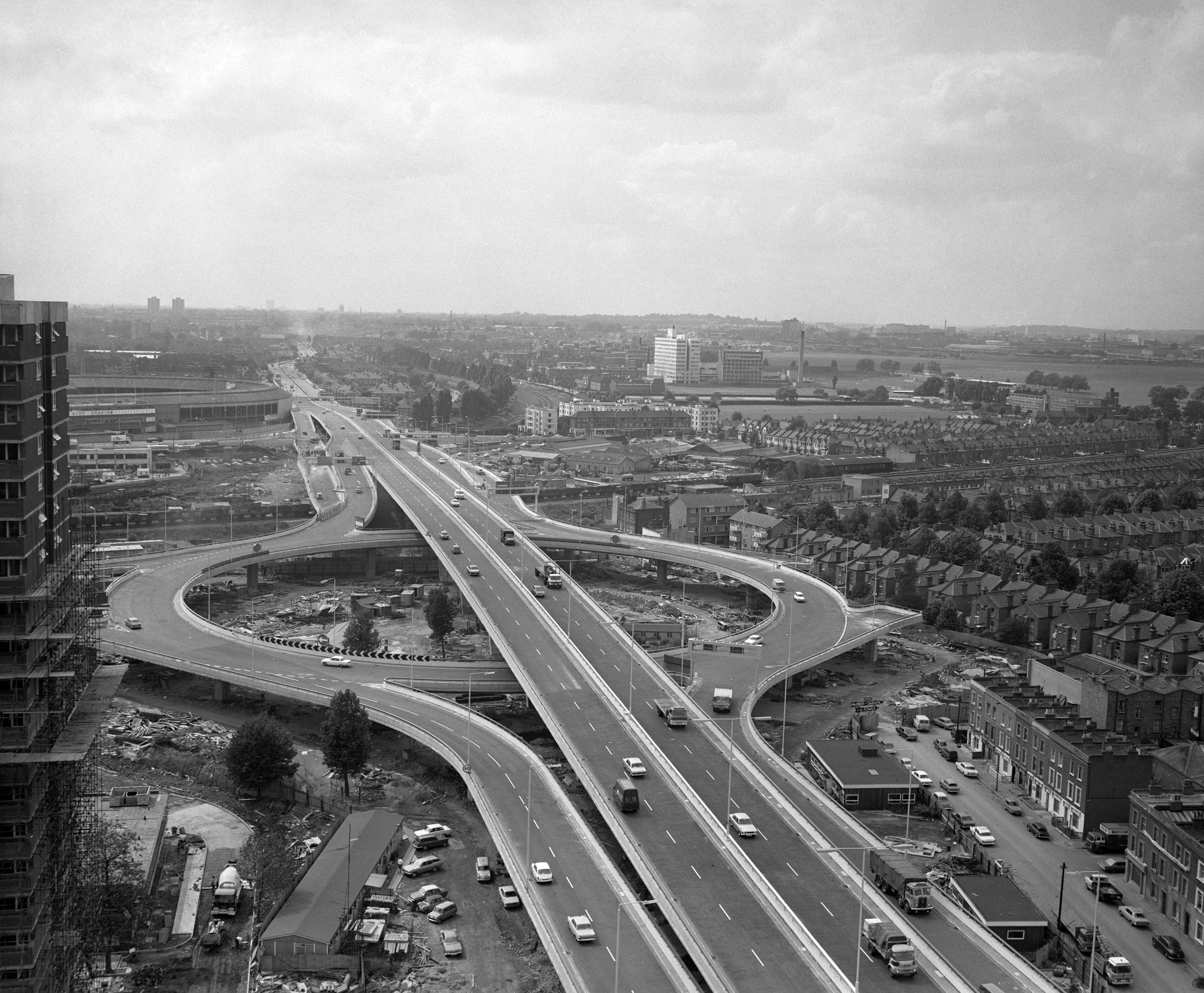 A general view of the finished Western Avenue Extension, known as Westway. It is a 2.5 mile long elevated dual carriageway section of the A40 route in west London running from Paddington to North Kensington. It was built to relieve congestion at Shepherd's Bush caused by traffic from Western Avenue. Top left is White City Stadium.