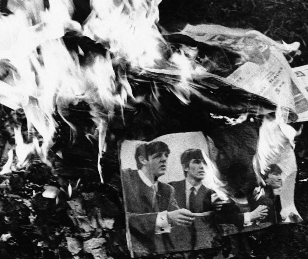 The Beatles went up in smoke near Fort Oglethorpe, Ga., on August 12, 1966 as neighborhood youngsters severed once and for all their twoyear friendship with the four world figures. The Beatlemania bonfire, planned by Chuck Smith, 13, was in protest against John Lennon remark to the effect that the Beatles are more popular than Jesus. (AP Photo)
