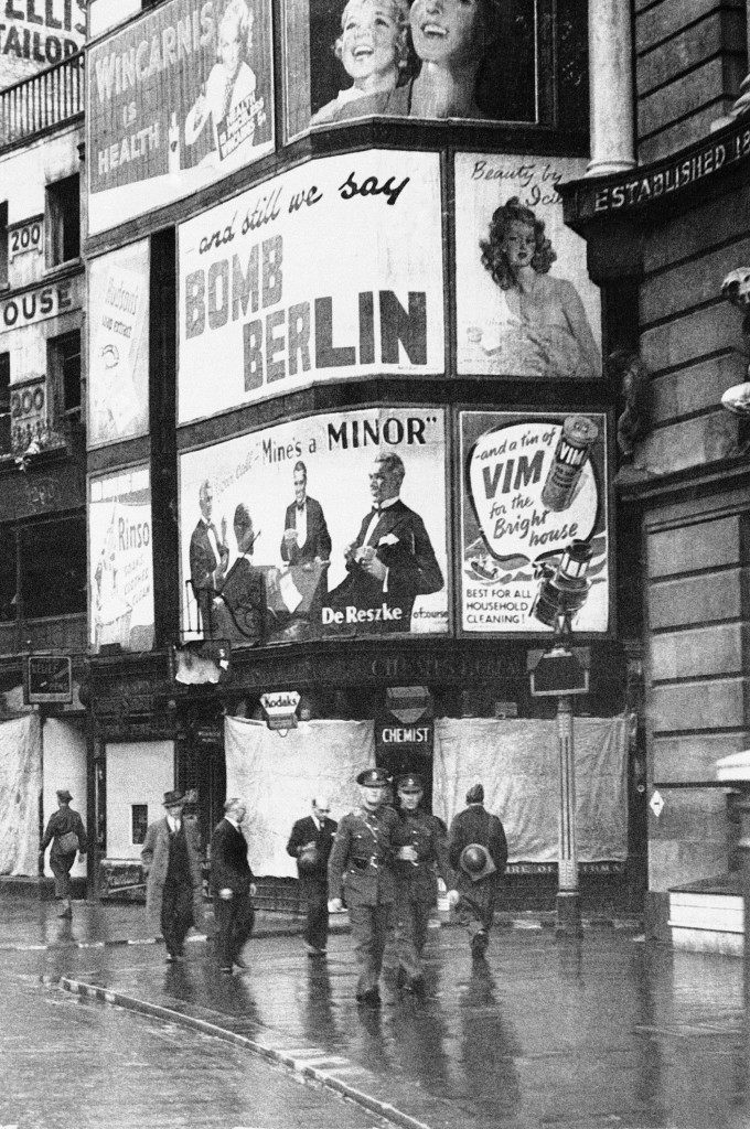 From a choice billboard spot on London?s busy strand, this sign advocates in plain language that the R.A.F. carry out reprisals for German Luftwaffe attacks in London, Oct. 18, 1940. It is one of many erected privately in various parts of London.