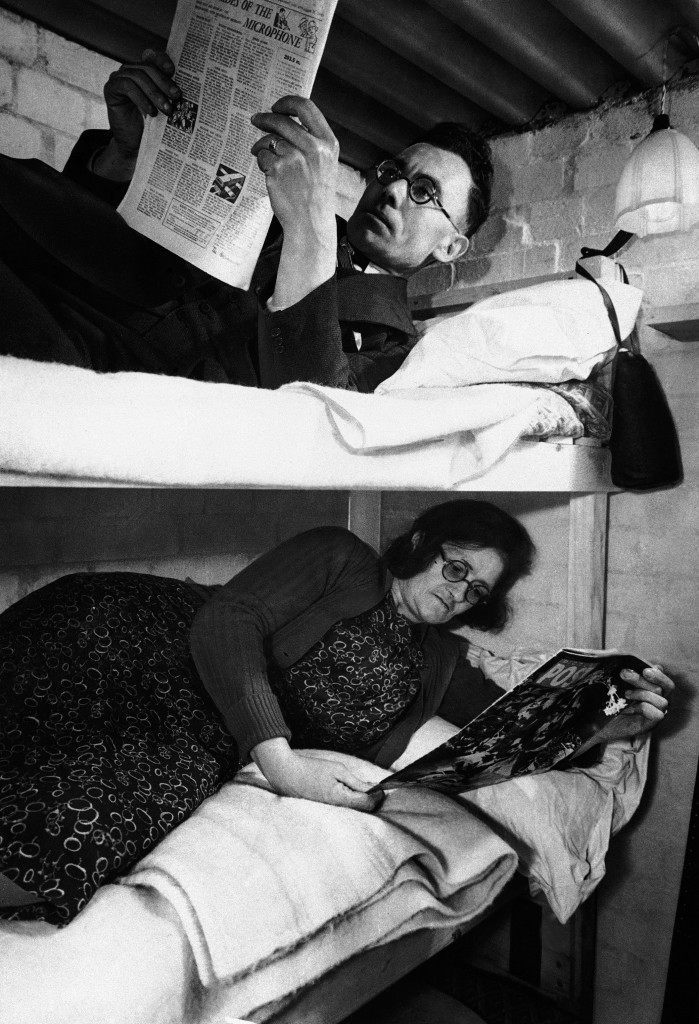 Mr. and Mrs. Walker of southwest London in 1940, don?t have to run out of their house hurriedly, when an air raid siren sounds. They have their own brick shelter in the front room of their home. Here they are enjoying the comforts of home with comparative safety, according to British caption. It has been approved by protection authorities. (AP Photo)