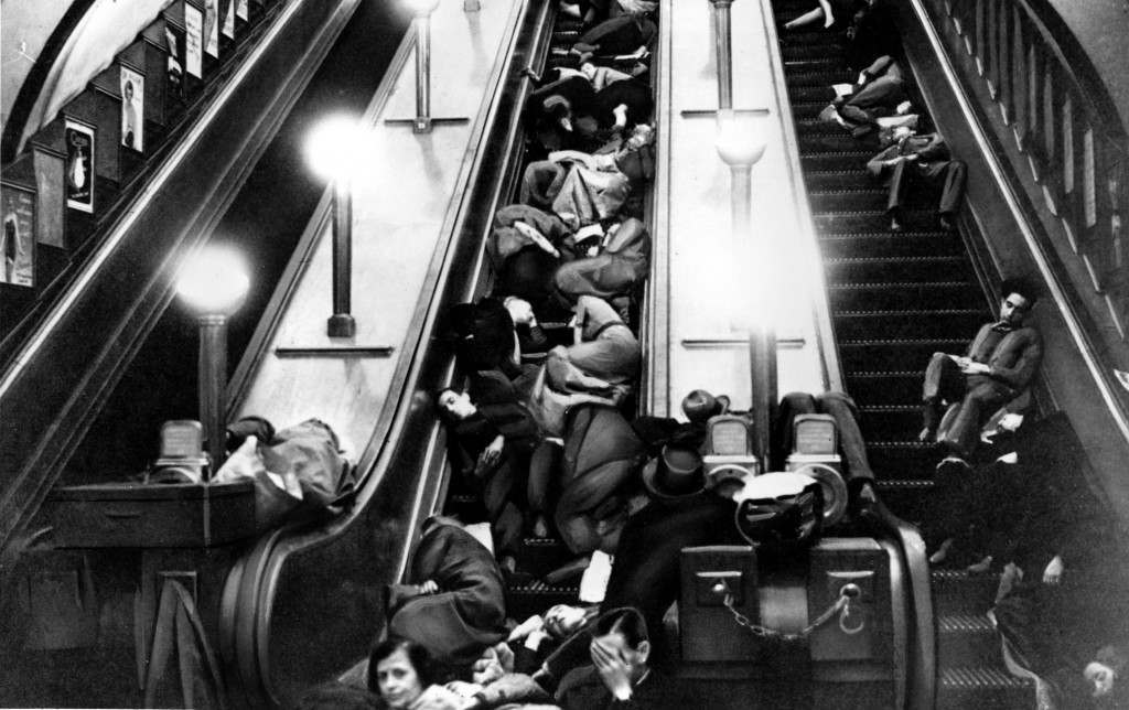 Londoners sleep on stopped escalators of a tube station for safety and shelter during heavy bombing by the Germans in London, England, in 1940 during the blitz in World War II. (AP Photo)