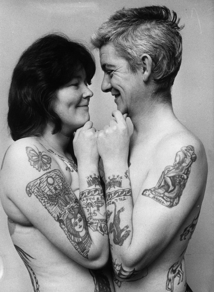 10th February 1972:  A loving couple, Ivor and Marianne Collier, display their mutual adoration and taste for tattooes.  (Photo by Ian Tyas/Keystone Features/Getty Images)