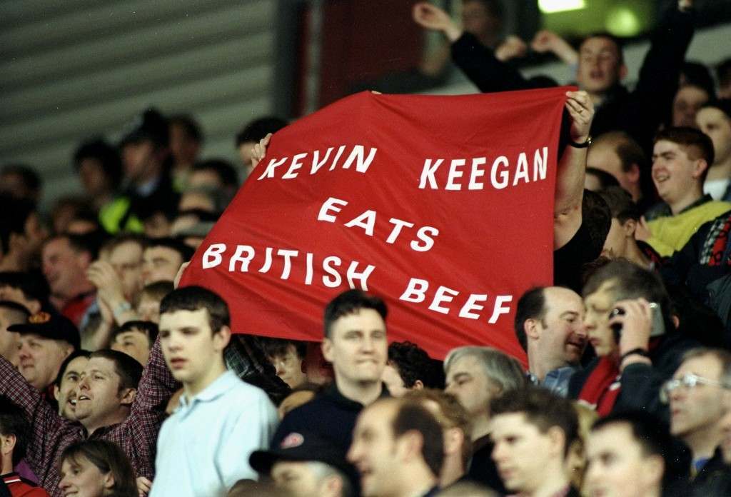 5 May 1996:  Manchester United fans hold up a banner questioning the mental stability of rival Newcastle United manager Kevin Keegan during an FA Carling Premiership match against Middlesbrough at Old Trafford in at the Riverside Stadium in Middlesbrough, England. Manchester United won the match 3-0 and became league champions.  Mandatory Credit: Ben  Radford/Allsport