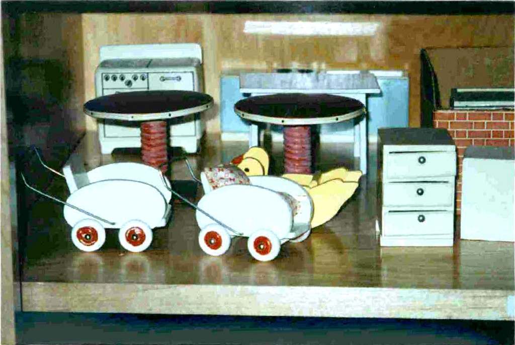 Dollhouse furniture and accessories, organized on shelves in Huguette Clark's Fifth Avenue apartments. Taken from snapshots among her personal papers.
