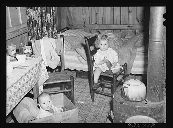 Title: In the second story of a tobacco barn used as living quarters by family of workers from Fort Bragg, North Carolina. Near Fayetteville, North Carolina Creator(s): Delano, Jack, photographer Date Created/Published: 1941 Mar.
