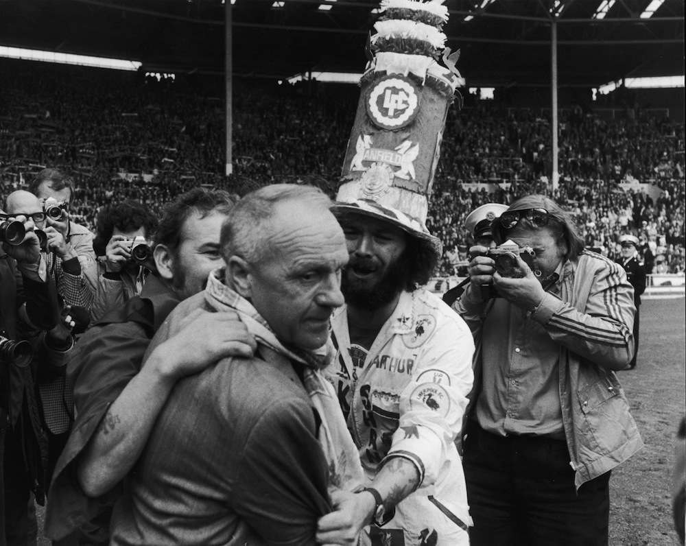 Liverpool Football Club manager Bill Shankly (1913 -1981) receives the praise of jubilant fans after FA Cup winning, Liverpool's 6-5 defeat (after penalties) of League champions and bitter rivals, Leeds United, in the Charity Shield at Wembley.   (Photo by Keystone/Getty Images)