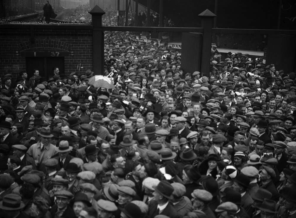 March 1936:  A section of the enormous crowd of football spectators leaving the stadium , after the FA Cup semi-final match between Arsenal and Grimsby Town.  (Photo by Fox Photos/Getty Images)