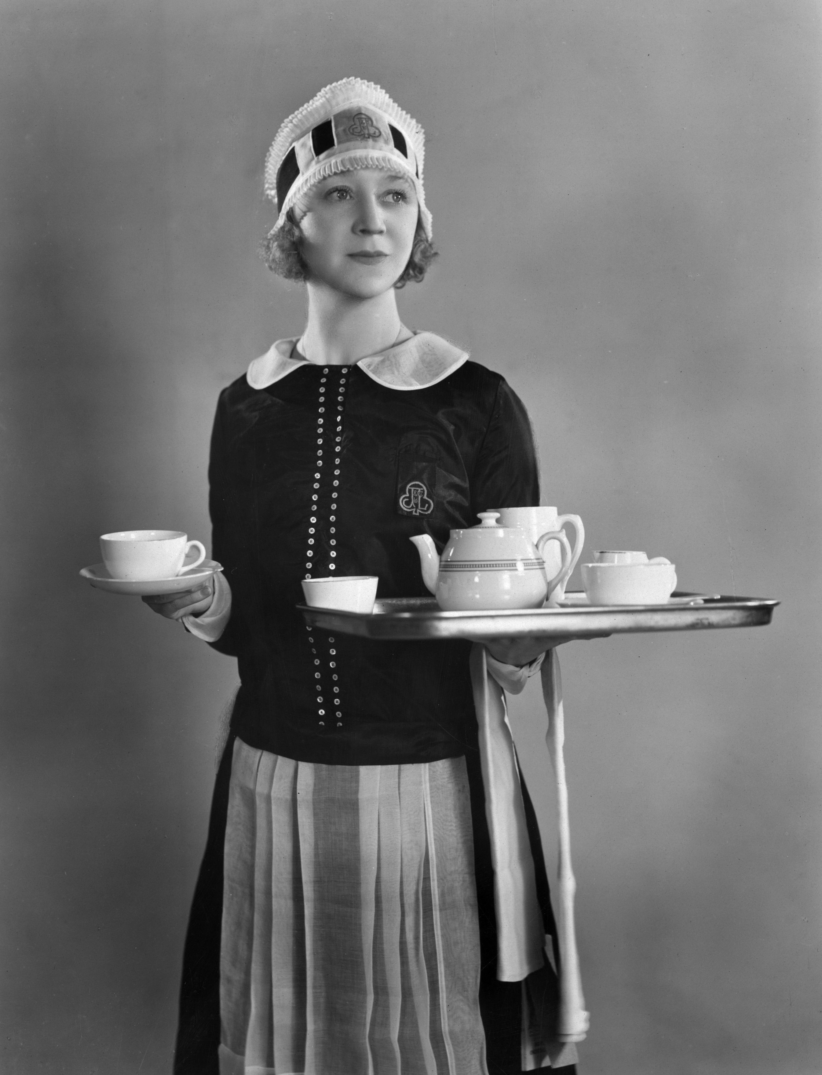 30th August 1930:  British revue comedienne Binnie Hale (1899 - 1984), formerly Beatrice Mary Hale-Monro dressed as a waitress for her part in the Julian Wylie production 'Nippy', showing at the Prince Edward Theatre in London.  (Photo by Sasha/Getty Images)