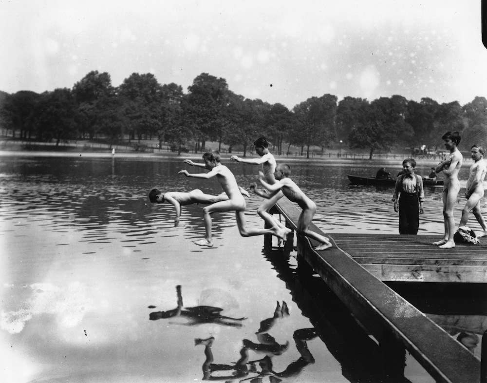 A group of naked boys jumping into the lake at Hyde Park during a heat wave...