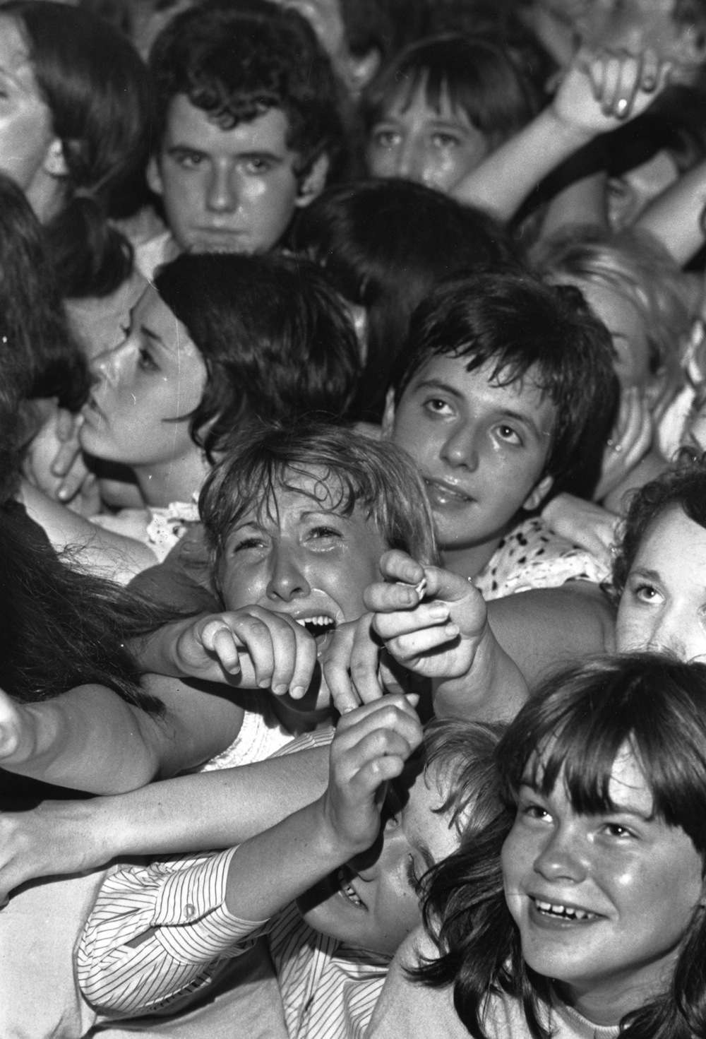Ecstatic fans at a Rolling Stones concert at Wimbledon Palais, London. 