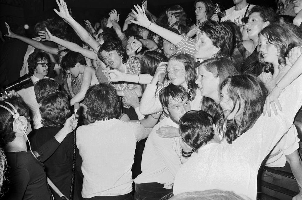 Fans of pop singer David Bowie at the last concert he performed in his Ziggy Stardust persona, at the Hammersmith Odeon, London, 3rd July 1973. (Photo by Steve Wood/Express/Hulton Archive/Getty Images)