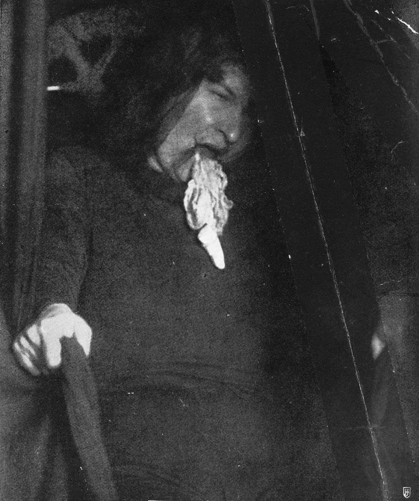 A strange substance, identified as ectoplasm, emerges from the mouth of medium Marthe Beraud (aka Eva C) during a seance, circa 1910. Picture taken from 'Les Phenomenes dits de Materialisation' by Juliette Bisson. (Photo by Hulton Archive/Getty Images)