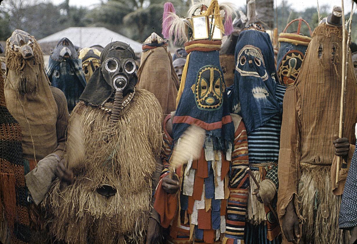Igbo mask dancers performing during the Onwa Asaa festival, Ugwuoba village, Nigeria. 