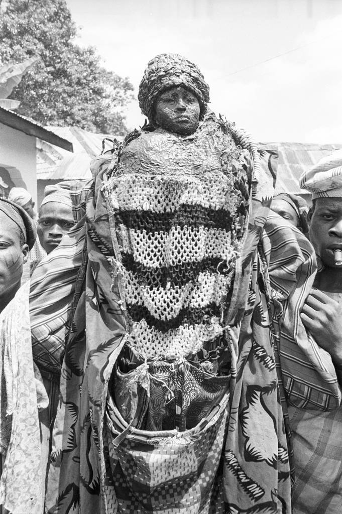Nufori acrobat-mask performs the final rituals of a Senufo funeral, near Korhogo, Ivory Coast