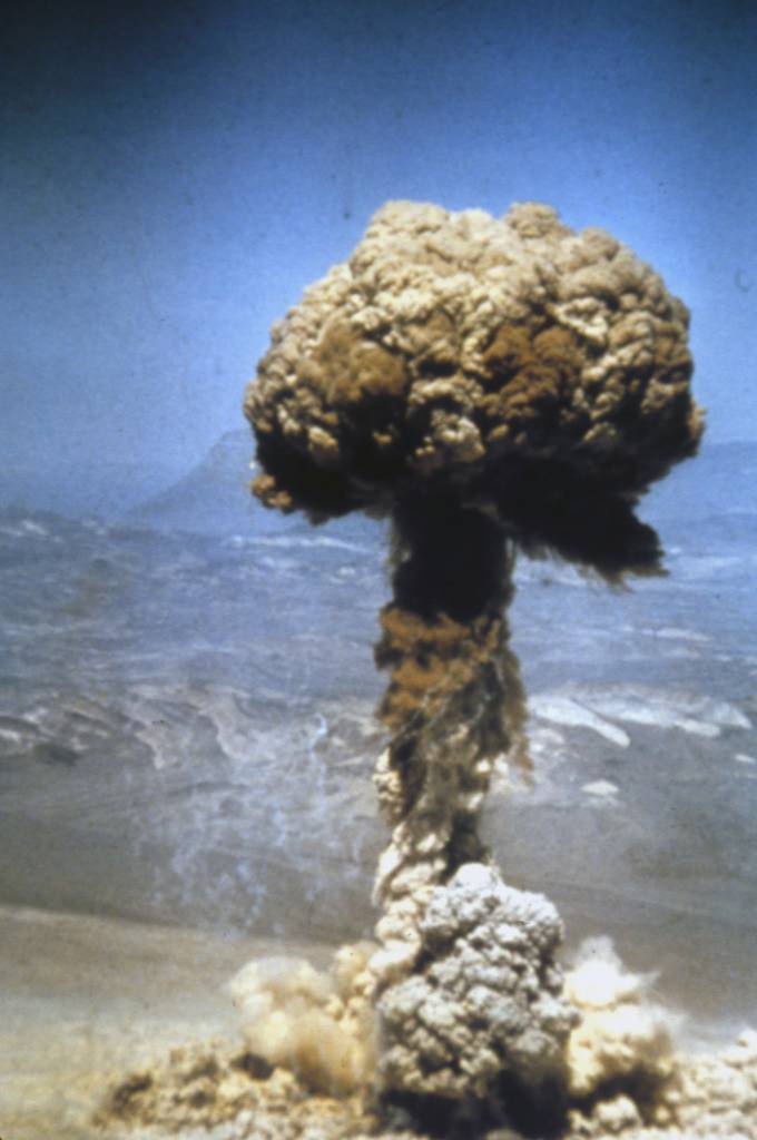 A mushroom cloud reaches high into the sky during atomic testing in Nevada, USA, circa 1940. 