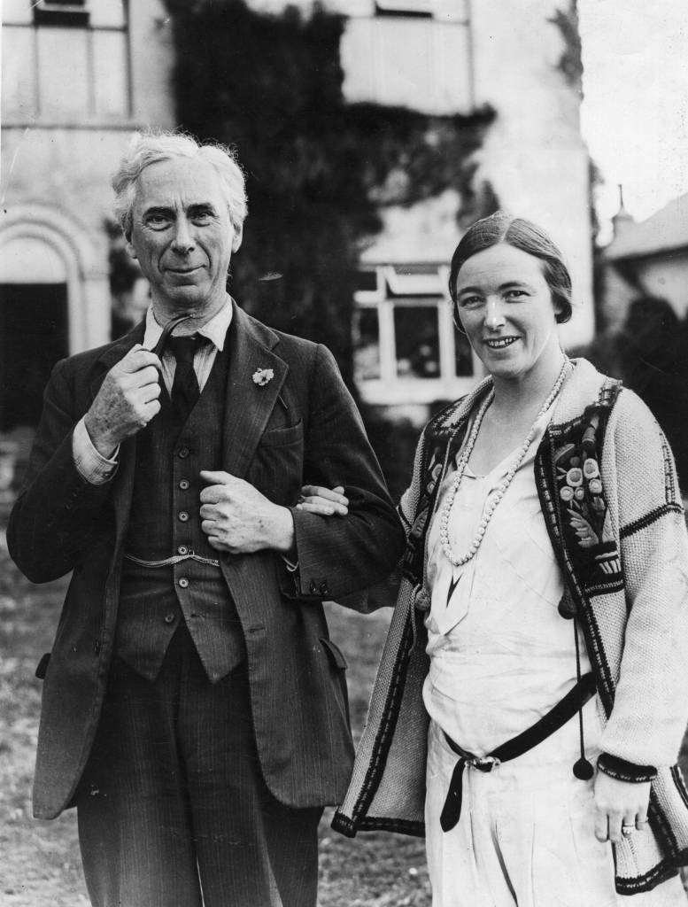 British philosopher Bertrand Russell (1872 - 1970)with his wife, Countess Dora Russell (1984 - 1976), outside the experimental Beacon Hill School, 20th September 1931. Founded by the Russells, the school took a radical and liberal approach to children's education.  (Photo by Hulton Archive/Getty Images)