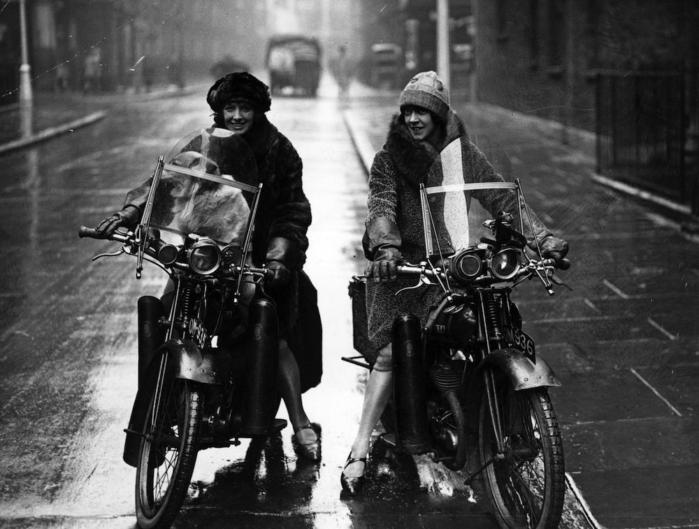 23rd September 1925:  The Debenham sisters wearing fur and waterproof clothing for the winter motorcyclist. The women are riding BSA cycles.  (Photo by H. F. Davis/Topical Press Agency/Getty Images)
