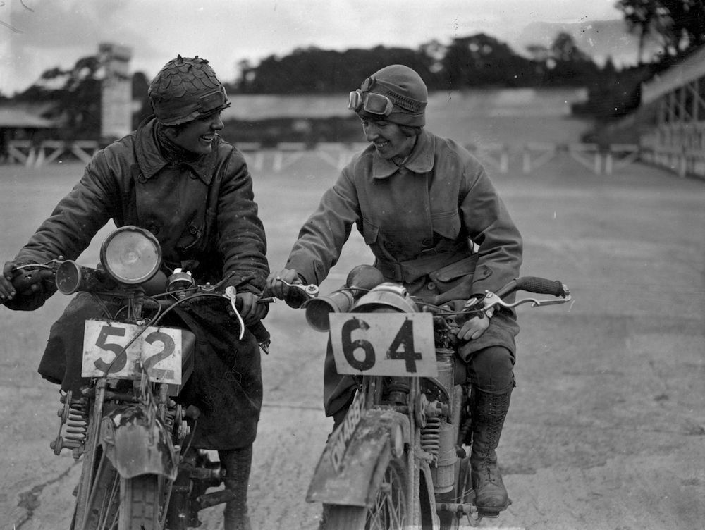 22nd August 1925:  Miss E Foley and Miss L Ball on their motorcycles at the International Six Days Reliability Trials at Brooklands race track.  (Photo by Kirby/Topical Press Agency/Getty Images)