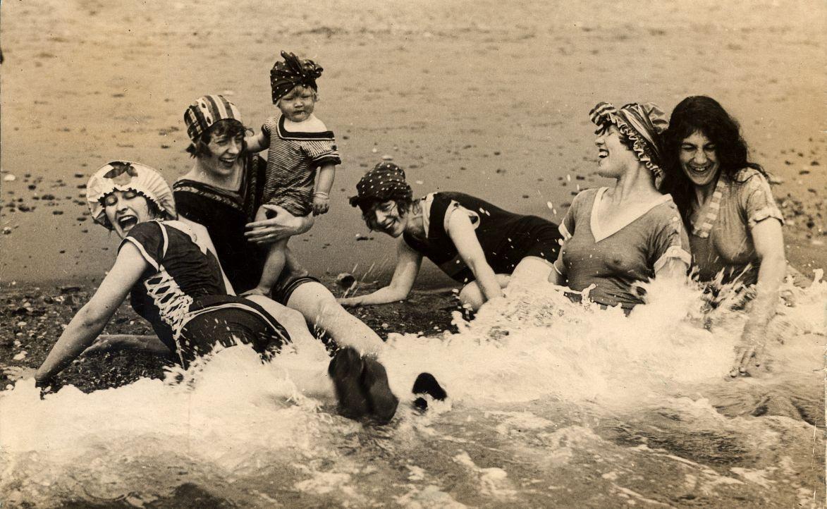 Women having fun in the sea. Location and date unknown.