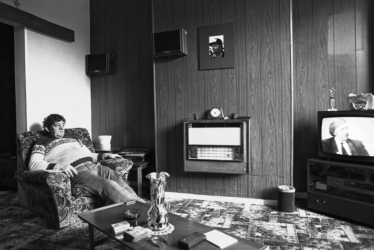 A miner watches an interview with NUM president Arthur Scargill in Wombwell, South Yorkshire, 1984.