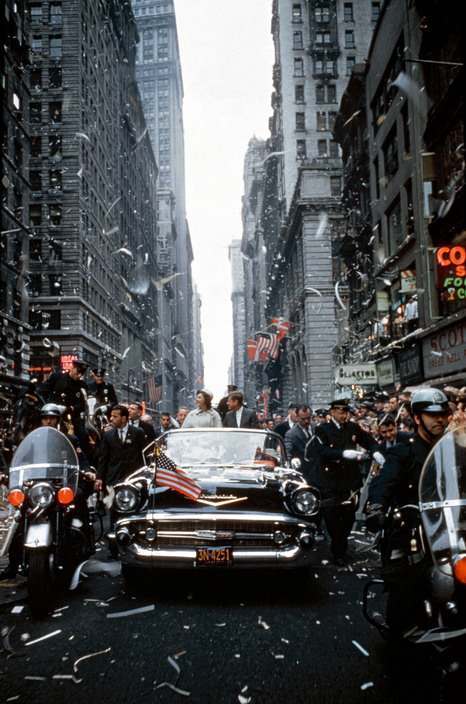 USA. New York City. 1960. Senator John F. KENNEDY and Jacqueline KENNEDY campaign during a ticker tape parade in Manhattan.