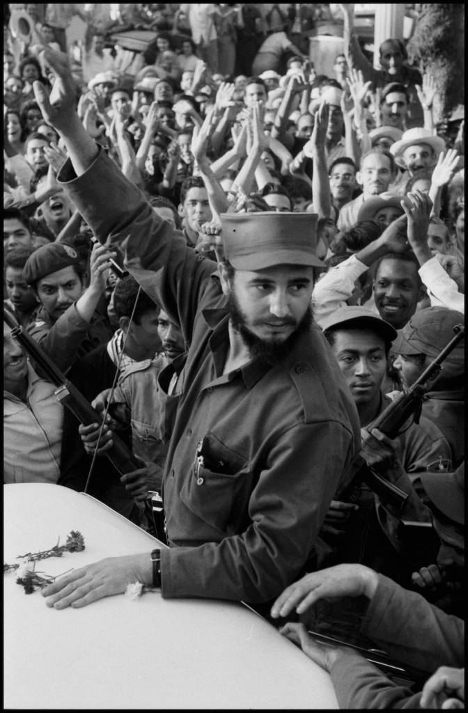 CUBA. 1959. Times of euphoia as Fidel CASTRO and his army tries to drive through the city of Ciefuego, on their way to liberate Havana.