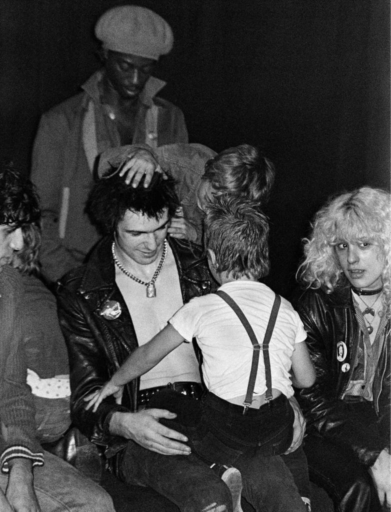 Mandatory Credit: Photo by Ray Stevenson/REX Shutterstock (581295ax) Sid Vicious with children and Nancy Spungen Various