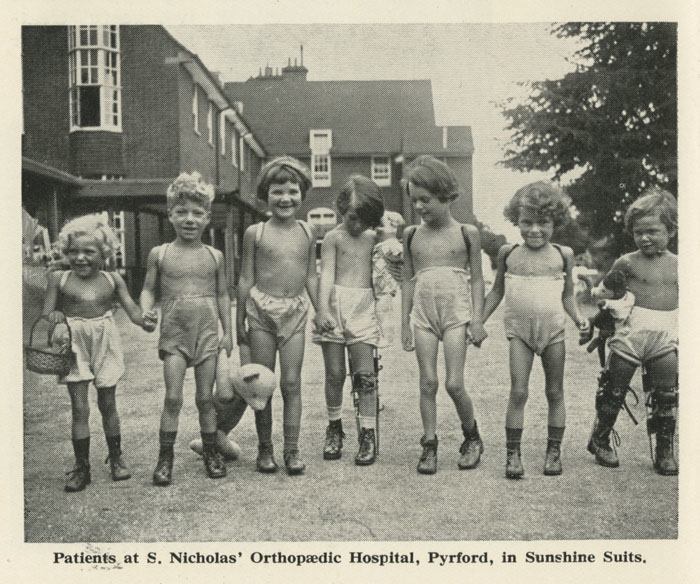 These children at St Nicholas’ and St Martin’s Orthopaedic Hospital and Special School in Pyrford, Surrey, are wearing what the caption calls ‘sunshine suits’