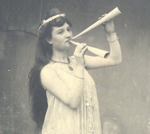 Marguerite Steinheil, posing as an ancient Greek aulos player.