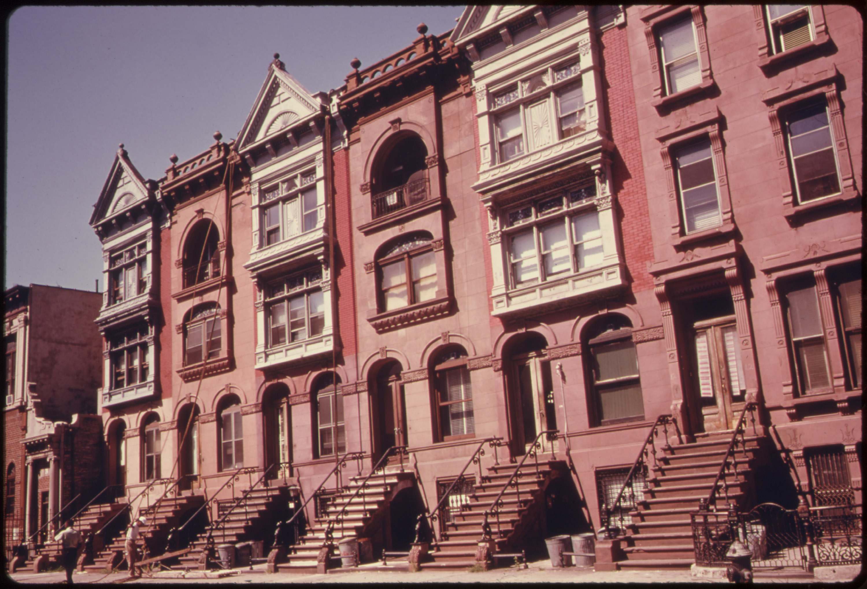 Turn of the century brownstone apartments being gentrified, Brooklyn, July 1974.