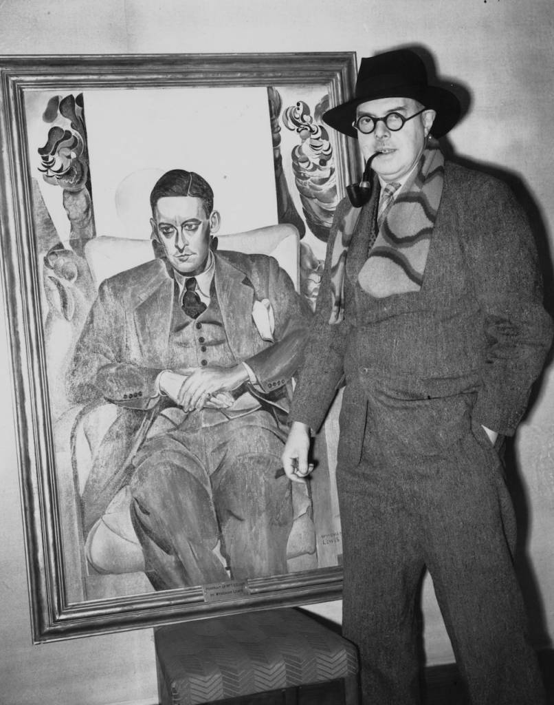 21st April 1938: Artist Wyndham Lewis (1882 - 1957) with his portrait of poet and author T S Eliot which has unexpectedly been rejected by the Royal Academy. (Photo by Fred Ramage/Keystone/Getty Images)