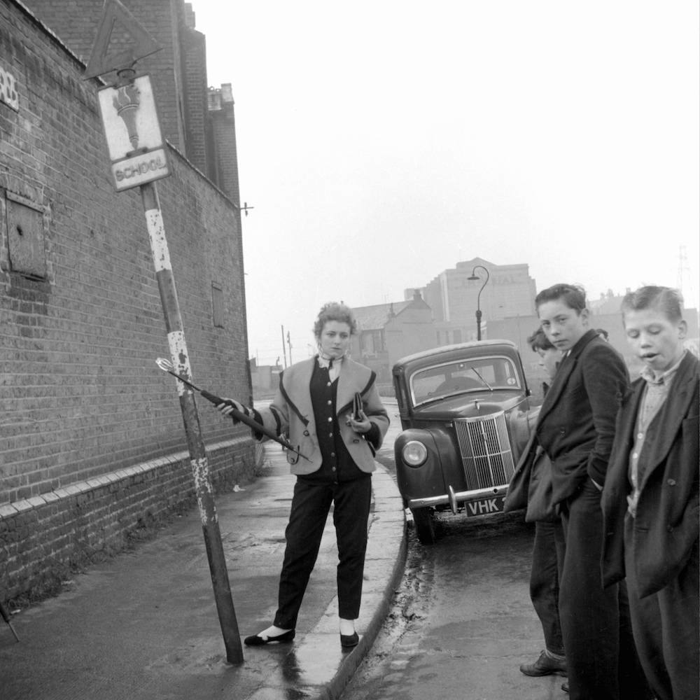 Photo by Ken Russell - January 1955 The last of the Teddy Girls Pat Wilson posing with umbrella aloft ©2006 TopFoto/Ken Russell