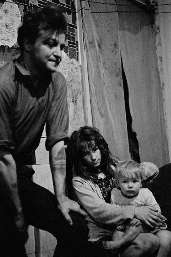 Family living in slum housing Newcastle's West End 1971