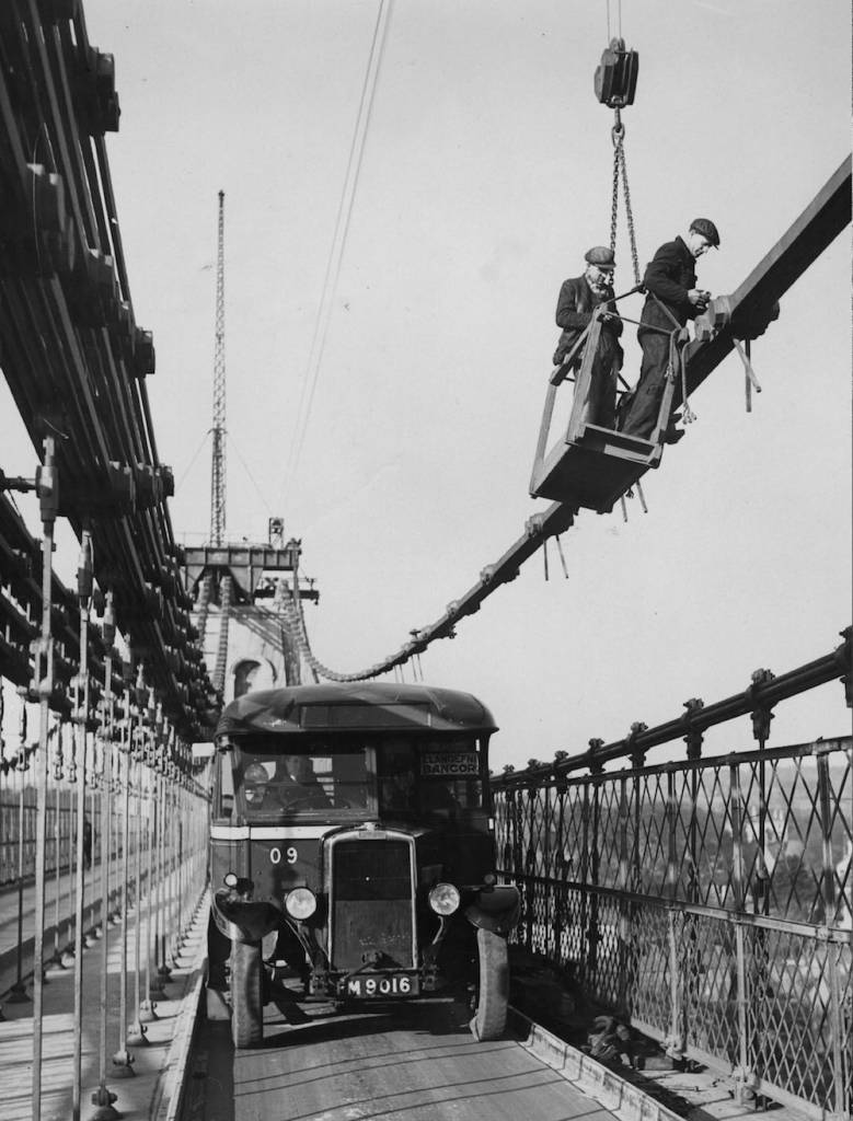 7th February 1939: Thomas Telford's Menai Suspension Bridge between mainland Wales and Anglesey is supported by two cables during repairs. (Photo by Fox Photos/Getty Images)