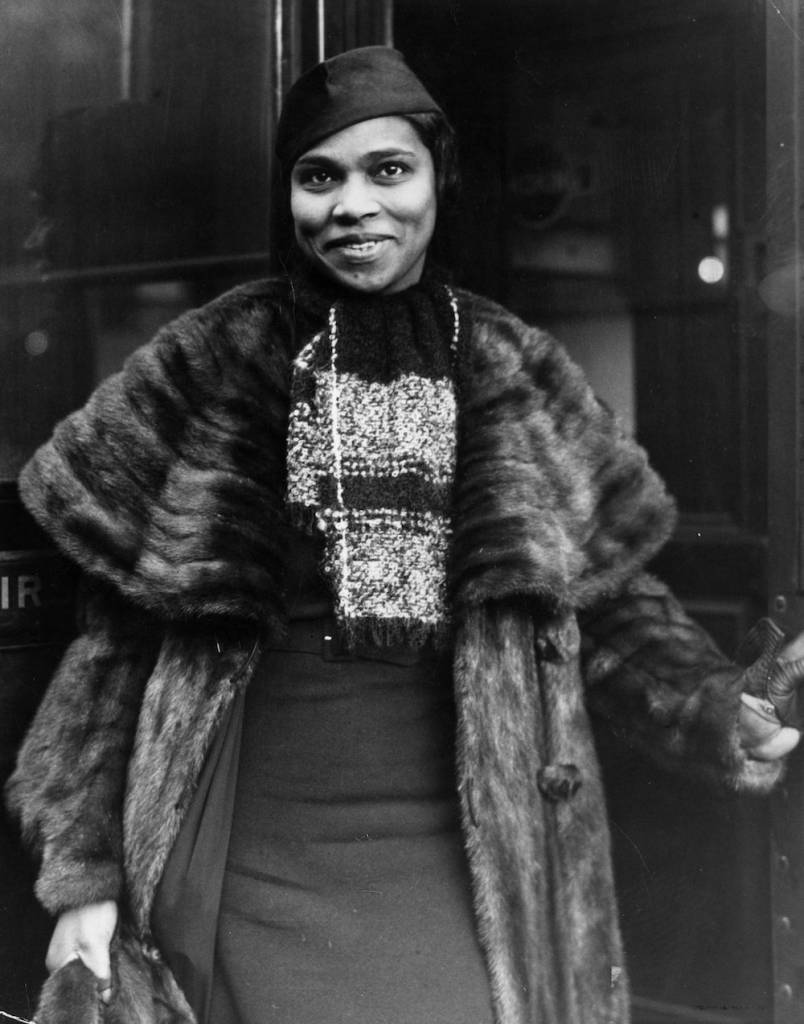 16th November 1936: American opera singer Marian Anderson (1897 - 1993), the first black singer to perform at the New York Metropolitan Opera House, on her arrival in London for a concert at the Queen's Hall. (Photo by General Photographic Agency/Getty Images)