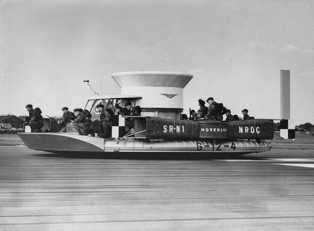 7th September 1959:  A Saunders-Roe hovercraft, with a group of Royal Marines on board, at the Farnborough airshow in Hampshire.  (Photo by Central Press/Getty Images)