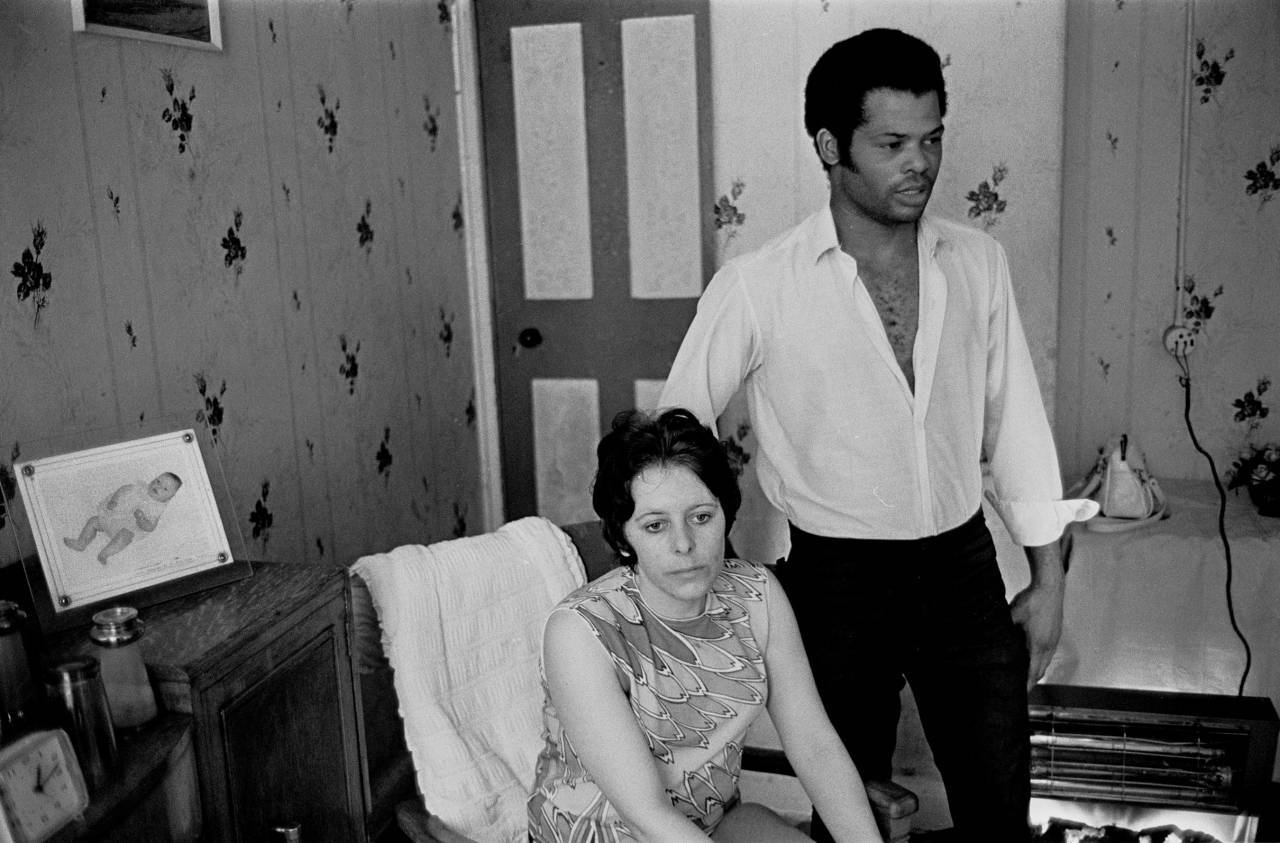Married couple and family living in overcrowded flat, South London 1972