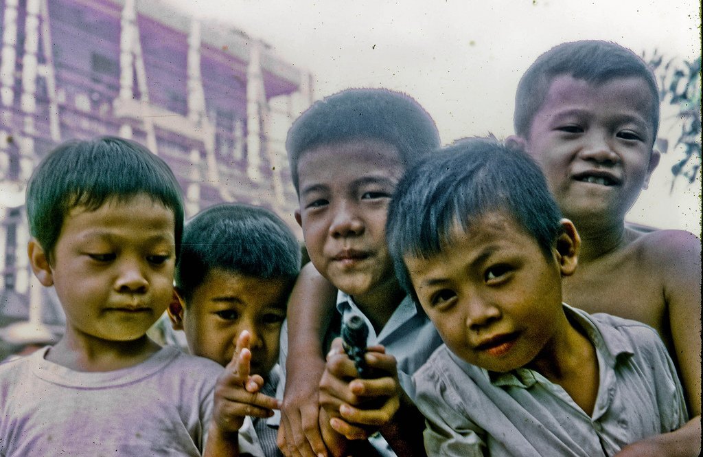 Street Brats in My Tho in 1969 On the street in front of the MACV Team 66 personnel residence, Hotel 1, in My Tho city, Dinh Tuong Province, Vietnam.