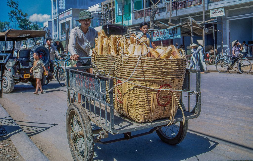 A reminent from the French colonial days, the long loaves of french bread were plentiful in My Tho. (Dinh Tuong Province, Vietnam)