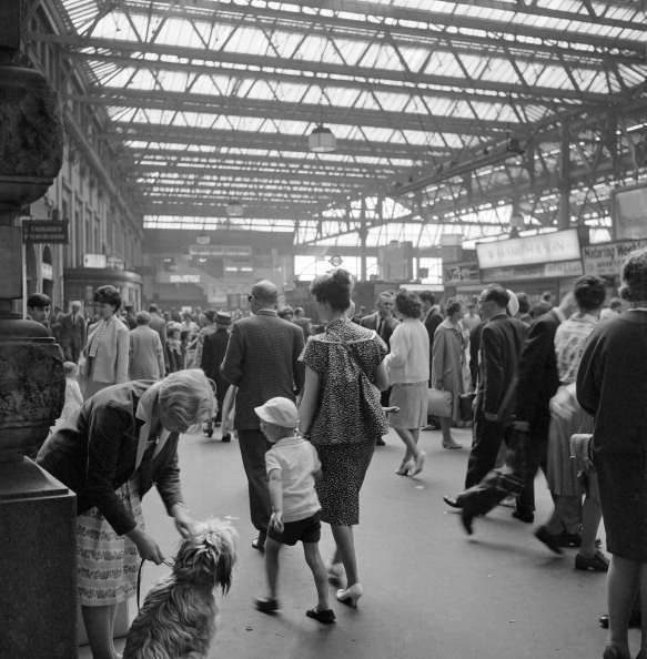 Passengers at Waterloo Station, London, 1962-1964. The crowded concourse. (Photo by English Heritage/Heritage Images/Getty Images)