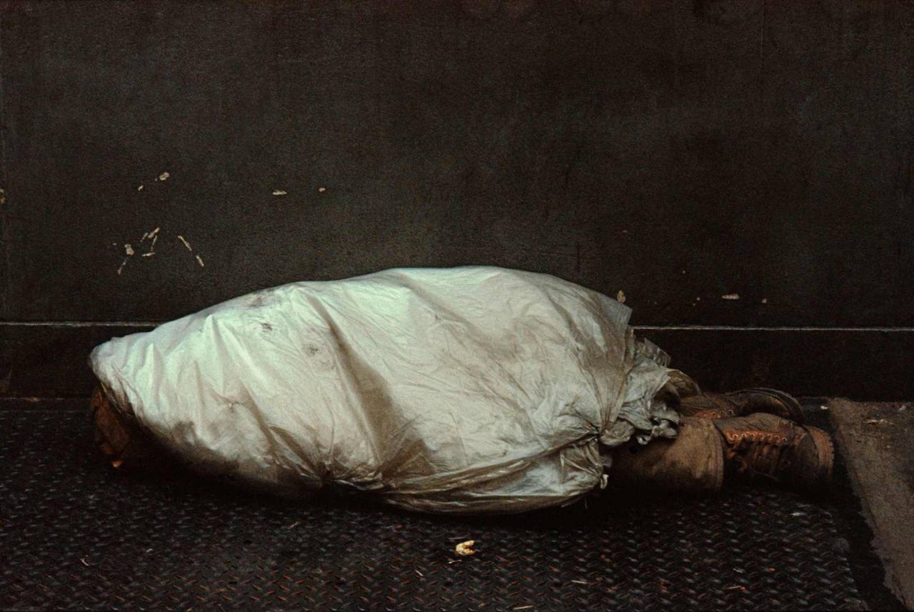 1984, New York, homeless person, under plastic