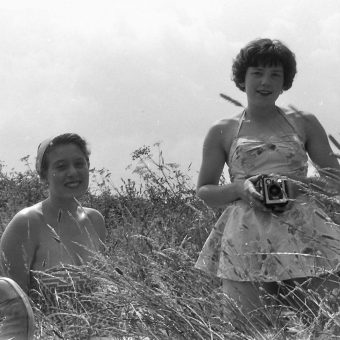 Boys And Girls Having 1950s Fun On The Norfolk Coast