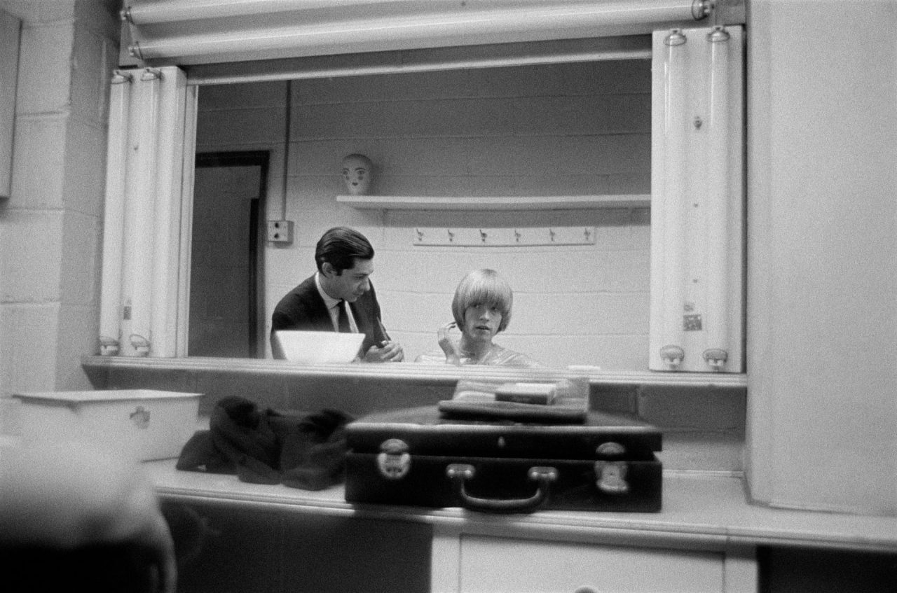 The Rolling Stones Brian Jones gets his haircut at NBC (October 1965) ‘He was very vain about his hair and is pictured here having it trimmed by the NBC studio hairdresser when the band appeared on the Hullabaloo TV show in New York’