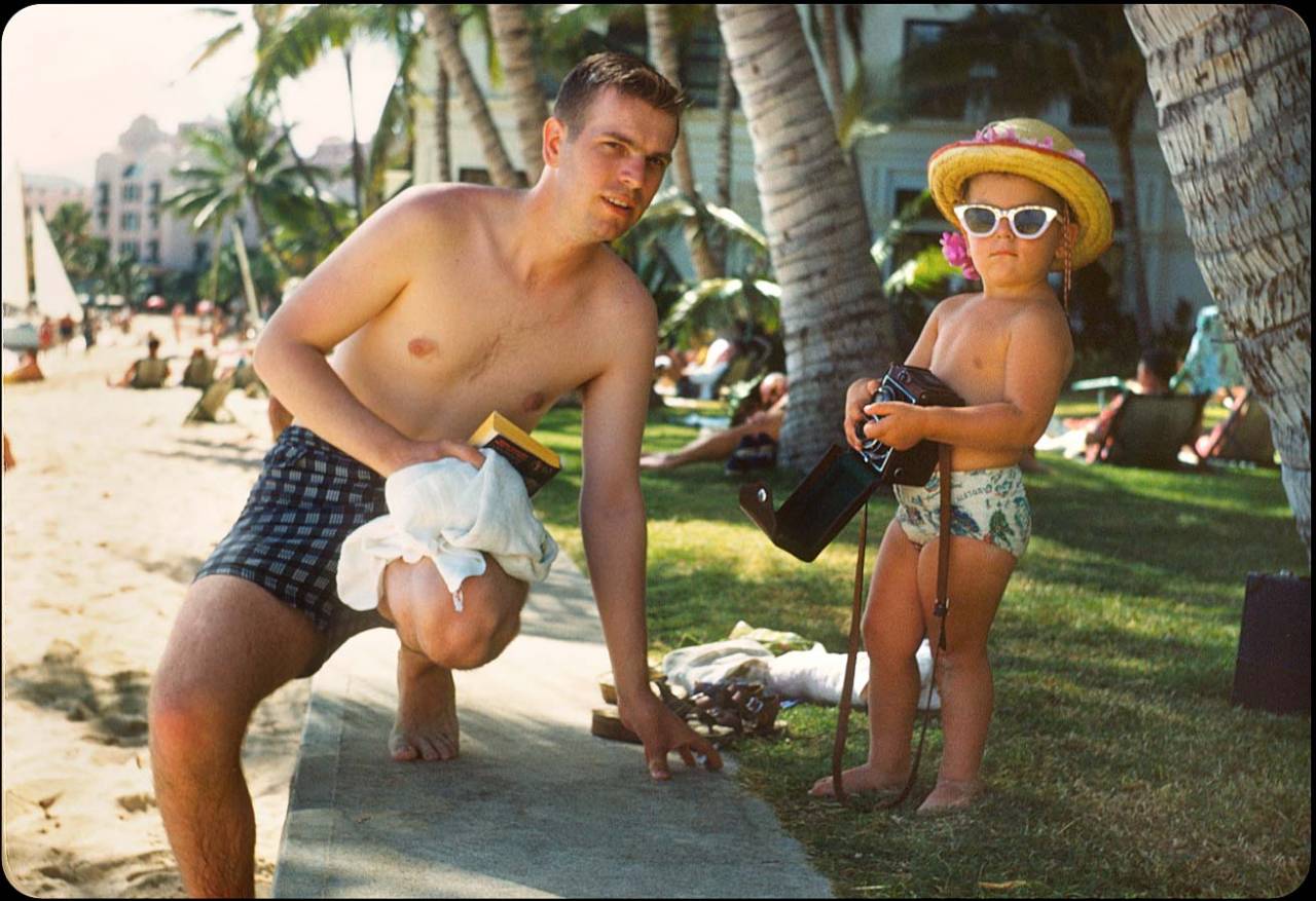Waikiki Beach 1950 Still thinking about Honolulu & Waikiki — these slides came from a pilot's collection who toured and photographed various places in the Pacific and Asia. Here, he catches up with what appears to be a miniature Jimmy Buffett while literally on shore-leave at Waikiki beach.