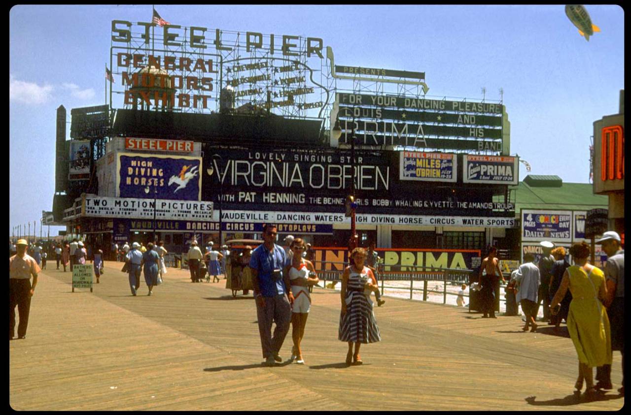 Steel Pier, Atlantic City - 1953 Lots of stuff going on here - I especially like the fact Louis Prima is here (In fact in three places). I first heard him when I was a kid in the movie "The Jungle Book" as the ape that sang "I Wanna Be Like You!". I still to this day like his voice and chops. I wonder what happened to the High Diving Horses? Anyway the whole Americana beach experience in Jersey sure looks different than Florida's!