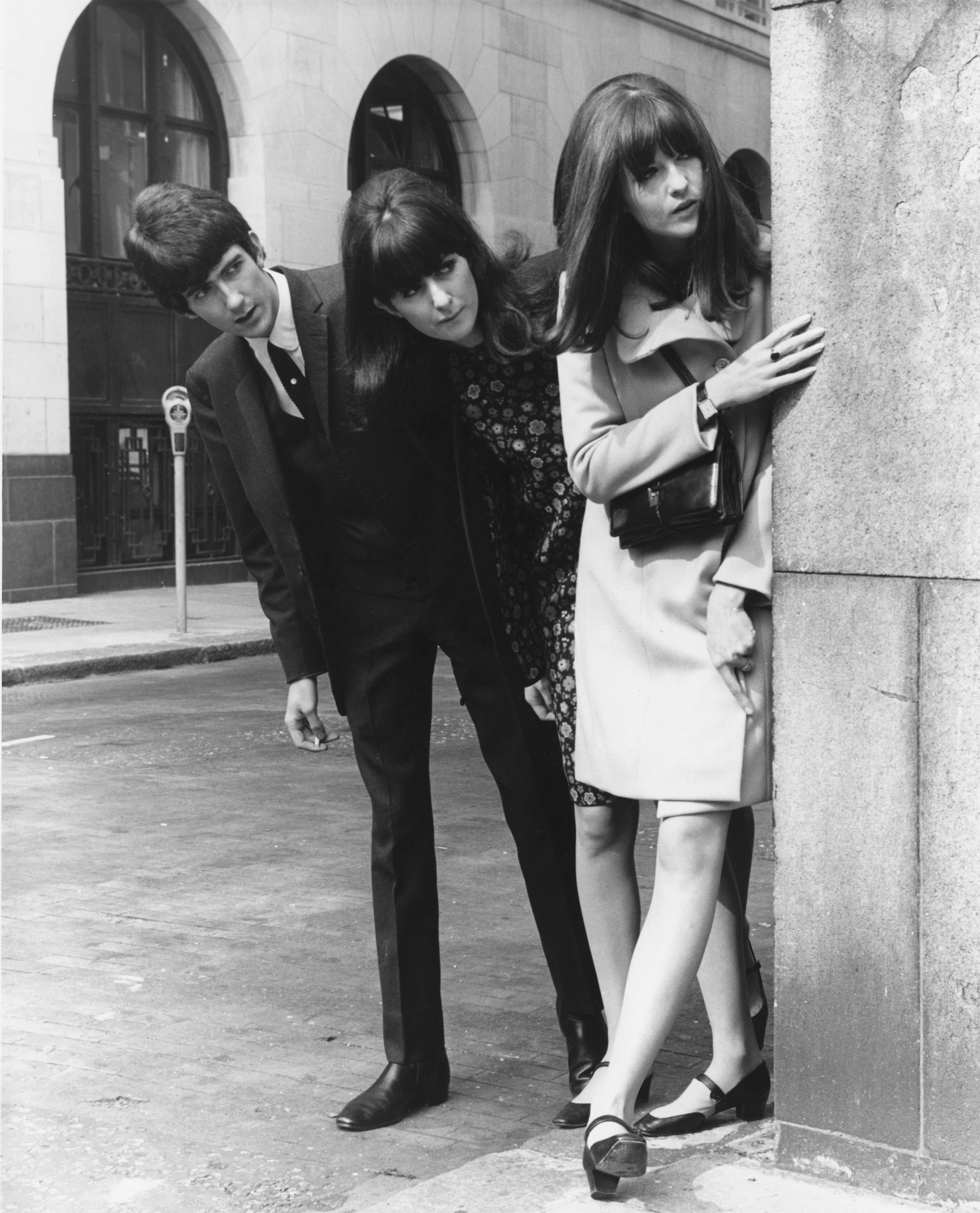 Television presenter Cathy McGowan (right) outside the Savoy Hotel, London, with her brother John and sister Frankie, 4th September 1965. McGowan presents the pop music television show 'Ready Steady Go' and has been attending a lunch at the Savoy for winners of the Melody Maker pop poll. (Photo by William Vanderson/Fox Photos/Hulton Archive/Getty Images)