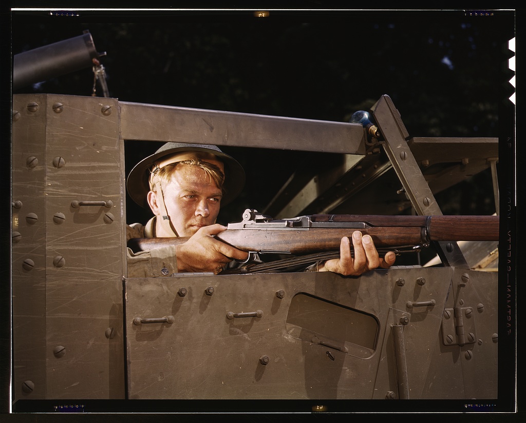 Halftrack infantryman with Garand rifle, Ft. Knox, Ky.
